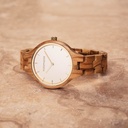 The AURORA Collection breaths the fresh air of Scandinavian nature and the astonishing views of the sky. This light weighing watch is made of European Olive Wood, accompanied by a light stainless-steel dial with a golden highlight and shining golden detai