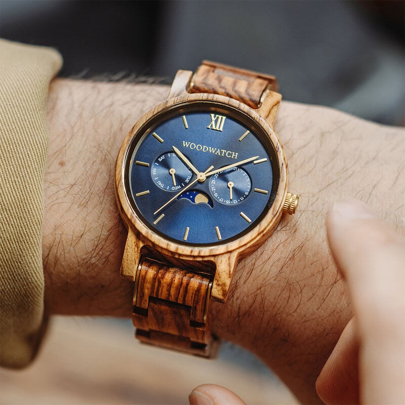 The CLASSIC Collection rethinks the aesthetic of a WoodWatch in a sophisticated way. The slim cases give a classy impression while featuring a unique moonphase movement and two extra subdials featuring a week and month display. 